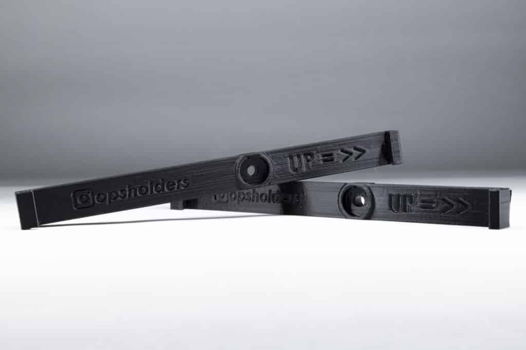 Black USA number plate holders with mounting point in the middle - OPSHOLDERS