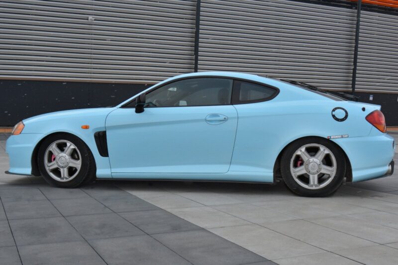 pol_po_RACING-SIDE-SKIRTS-DIFFUSERS-HYUNDAI-TIBURON-MK-2-FACELIFT-6770_4jpg - OPSHOLDERS