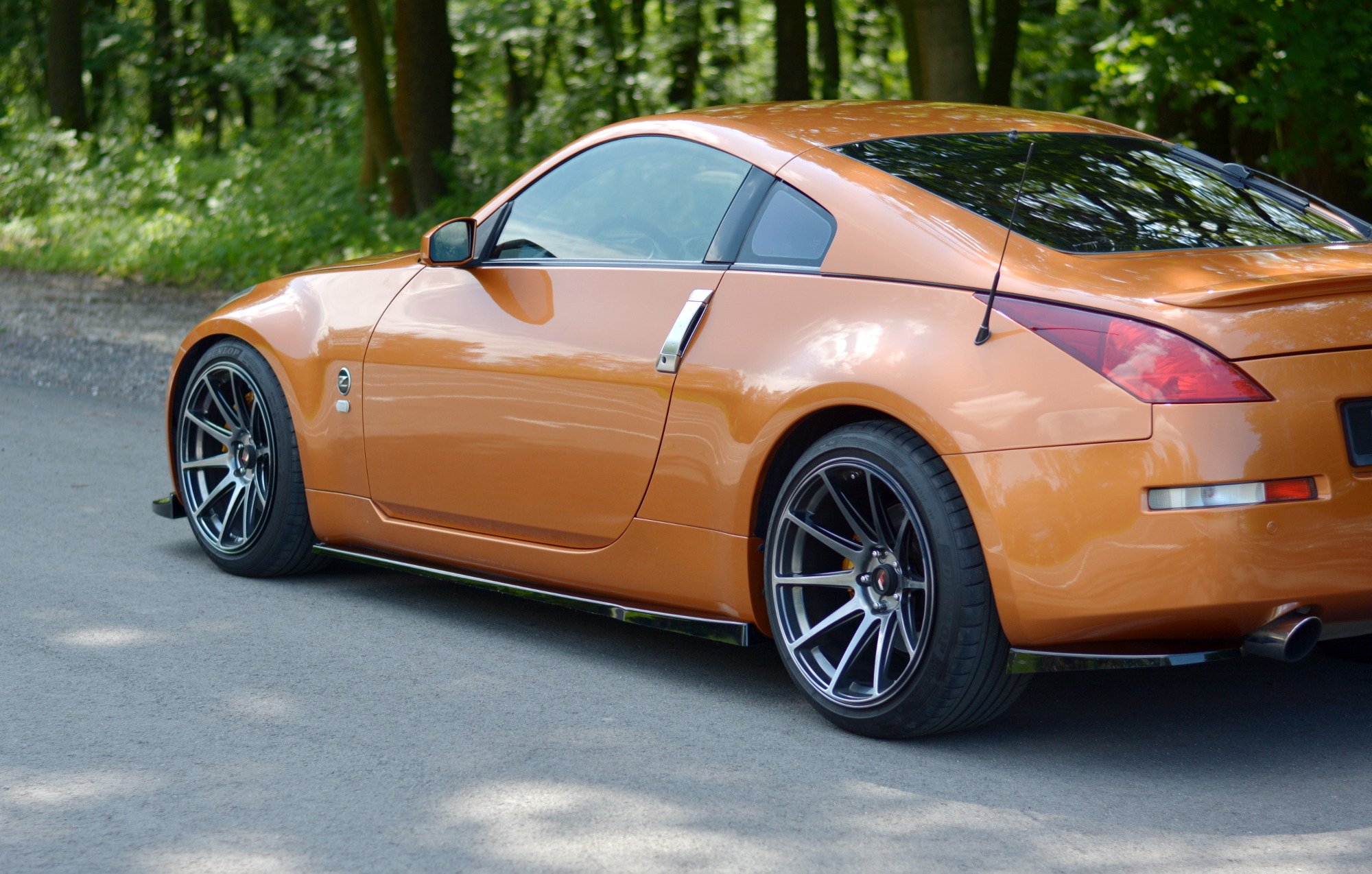 pol_po_SIDE-SKIRTS-DIFFUSERS-NISSAN-350Z-7706_2jpg - OPSHOLDERS
