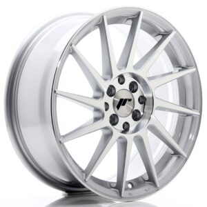 Silver twelve-spoke alloy car wheel with a polished center cap and lug holes seen from the front/side angle.