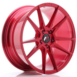 Red alloy car wheel with a multi-spoke design and a black center cap (performance rim). Absolutely red finish and glossy surface show angular spokes.