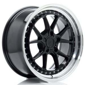 Black multi-spoke alloy wheel with a chrome lip and bolt detail around the rim