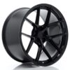 Glossy black alloy car wheel with a multi-spoke design, shown at an angle against a white background