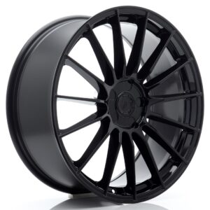 Glossy black multi‑spoke car wheel rim shown at an angle, highlighting the glossy finish and center hub.
