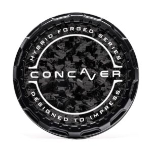 Black circular car wheel center cap with a textured black center, white ring text reading 'HYBRID FORGED SERIES' and 'DESIGNED TO IMPRESS', and the brand name 'CONCAVER' across the middle.