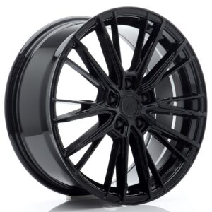 Black glossy multi-spoke alloy car wheel/rim with a polished lip, close-up view