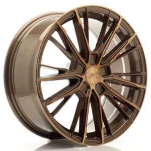 Bronze multi-spoke alloy car wheel rim with a polished outer edge.