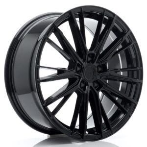 Black glossy multi-spoke alloy car wheel rim photographed at an angle