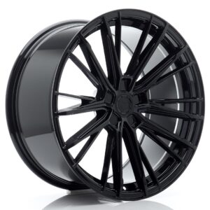 Black multi-spoke alloy car wheel with a glossy finish on a white background