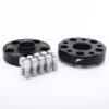 Two black metal wheel spacers with multiple holes and a set of silver lug bolts on a white background.