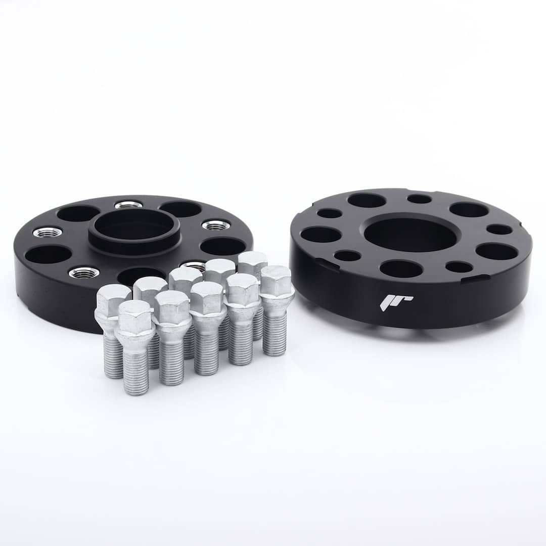 53027_0_38554jpg - OPSHOLDERS Two black metal wheel spacers with multiple holes and a set of silver lug bolts on a white background.