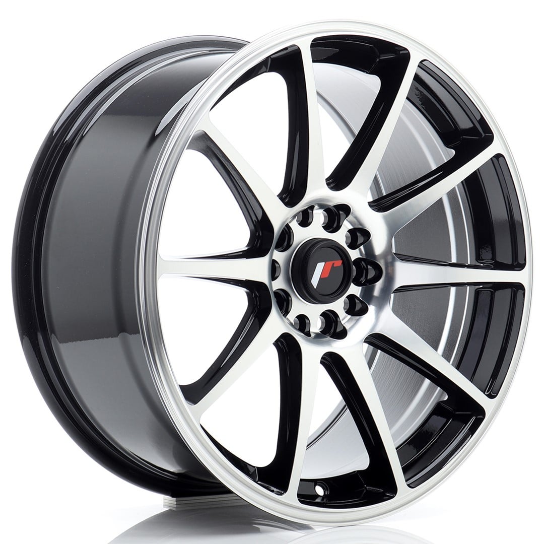 45738_0_35012jpg - OPSHOLDERS Shiny black and silver alloy car wheel with multiple spokes and a central hub cap.