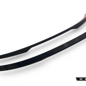 Two black curved car spoiler blades diagonally placed on a white background, with Maxton Design branding bottom right.
