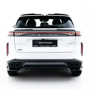 Rear view of a white SUV with a full-width red LED taillight strip and black bumper, featuring the plate reading #MAXTONIZED.
