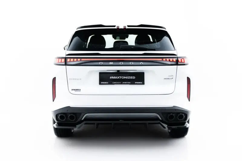 Rear view of a white SUV with a full-width red LED taillight strip and black bumper, featuring the plate reading #MAXTONIZED.