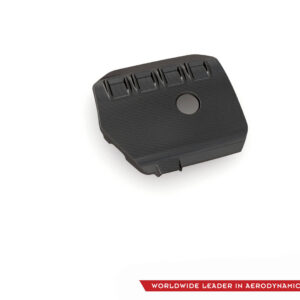 Black textured automotive component featuring four vent openings and a circular raised area, shown at an oblique angle on a white background.