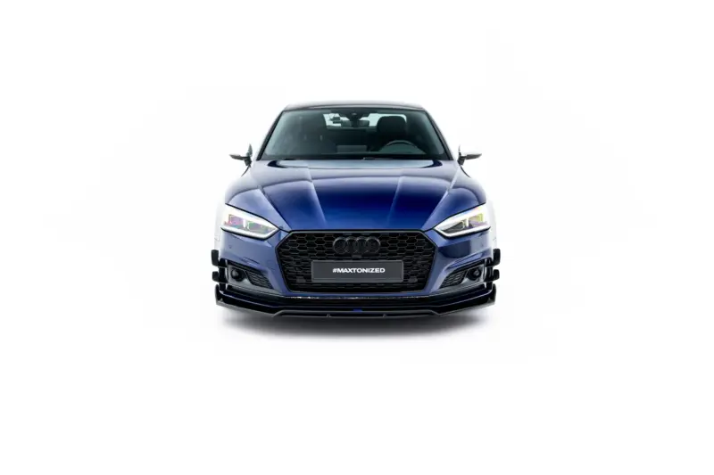 Front view of a blue Audi car facing forward, displaying the grille and headlights with a '#MAXTONIZED' plate text.