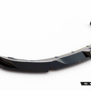 Curved, glossy black automotive aero part (lip/spoiler) on a white studio background with Maxton Design branding in the corner.