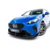 pol_po_Front-Splitter-BMW-2-M235i-Gran-Coupe-M-Pack-F74-23853_6webp - OPSHOLDERS Front-right angled view of a blue BMW sports car with a distinctive kidney grille on a white studio background, showing sleek lines and large alloy wheels.
