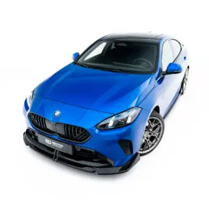 Blue BMW sports car shown from a high front-left angle against a white background, with the grille and headlights visible.