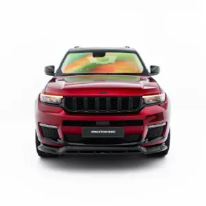 Front view of a red Jeep SUV facing the camera, with a black seven‑slot grille and illuminated headlights against a white background.
