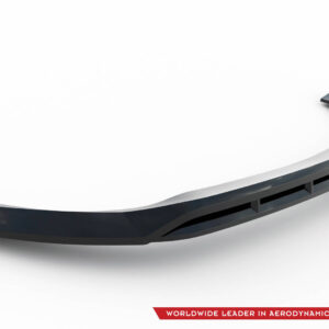 Curved, dark aerodynamic car component with internal ribs, displayed against a white background; brand logo in the bottom right corner.
