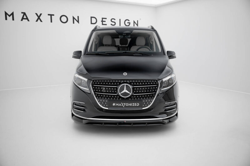 Front view of a black Mercedes SUV in a white showroom, wall reads 'MAXTON DESIGN' and the plate shows '#MAXTONIZED'