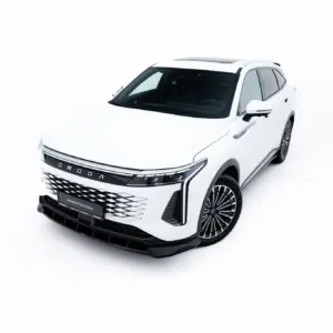 White SUV shown from a front-right angle in a bright studio setting, highlighting its grille and wheels