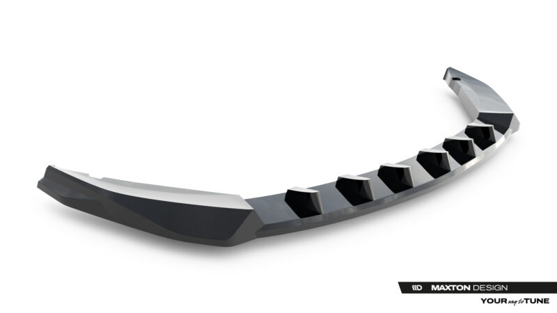 Curved metallic car bumper lip with angular fins along the inner edge, set against a white background.