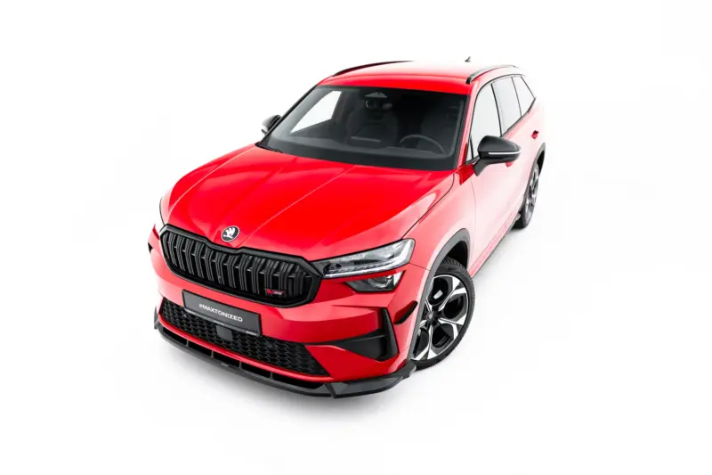 pol_po_Front-Splitter-Skoda-Kodiaq-RS-Mk2-23911_4webp - OPSHOLDERS Red SUV shown from a high front-left angle, highlighting the bold black grille and large alloy wheels against a white background.