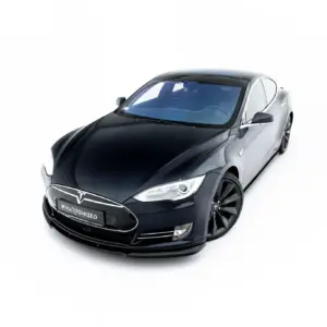 Front three-quarter view of a black Tesla electric sedan on a white background, logo visible on grille.