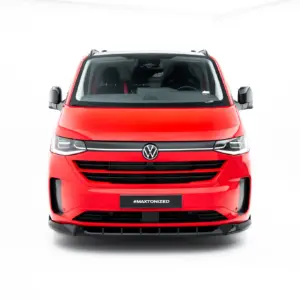 Front view of a red Volkswagen van with a black grille and VW badge, license plate shows #MAXTONIZED, white background.