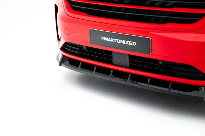 pol_po_Front-Splitter-V-1-Volkswagen-Transporter-T7-23937_6webp - OPSHOLDERS Close-up of a red car front showing a black license plate with the text #MAXTONIZED on the bumper area.