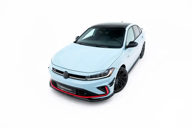 pol_po_Front-Splitter-V-2-Volkswagen-Jetta-GLI-Mk7-Facelift-2-23930_7webp - OPSHOLDERS Angled front-left view of a light blue hatchback with a black roof on a white backdrop, showcasing its sporty design.