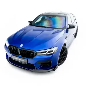 Blue BMW SUV shown from a front-left angle, highlighting the aggressive grille and sporty design.