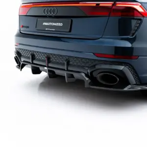 Rear view of a dark blue Audi SUV with '#MAXTONIZED' plate and sporty bumper details, taillights illuminated, and prominent exhausts.