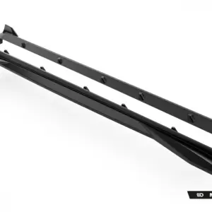 Carbon fiber roof rack crossbars with mounting feet, angled in a white studio setting, branded Maxton Design