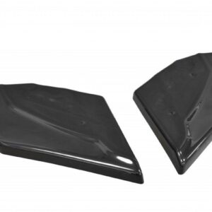 Two glossy black plastic wedge-shaped trim pieces on a white background, likely car exterior parts.