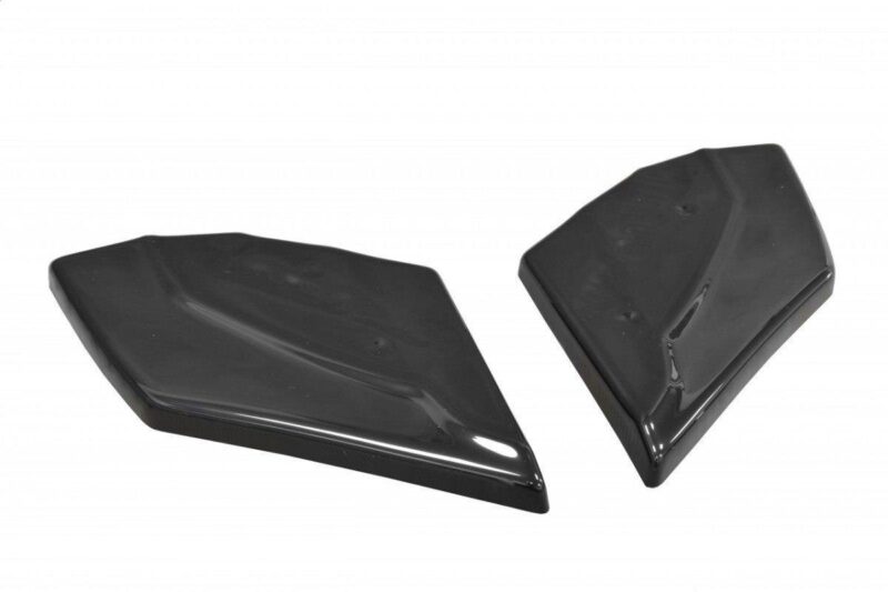 Two glossy black plastic wedge-shaped trim pieces on a white background, likely car exterior parts.