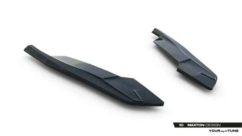 Pair of glossy dark-gray automotive splitter blades on a white background with Maxton Design branding nearby.