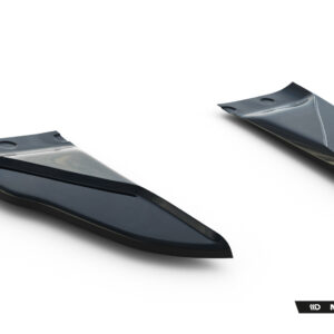 Two glossy curved car spoiler pieces in dark gray on a white studio backdrop, Maxton Design branding visible.