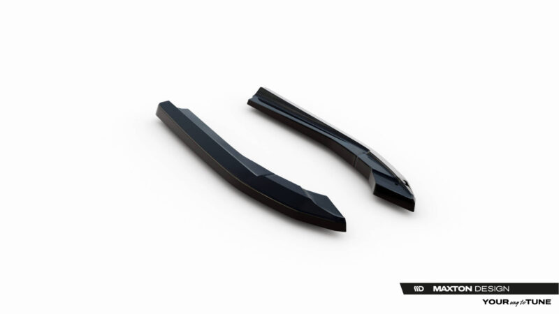 Pair of glossy black automotive aero parts (splitters/spoilers) on a white studio backdrop, Maxton Design branding visible at the bottom right.