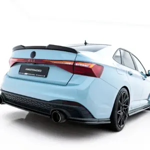 Rear three-quarter view of a light blue sporty car with a black diffuser and dual exhausts.