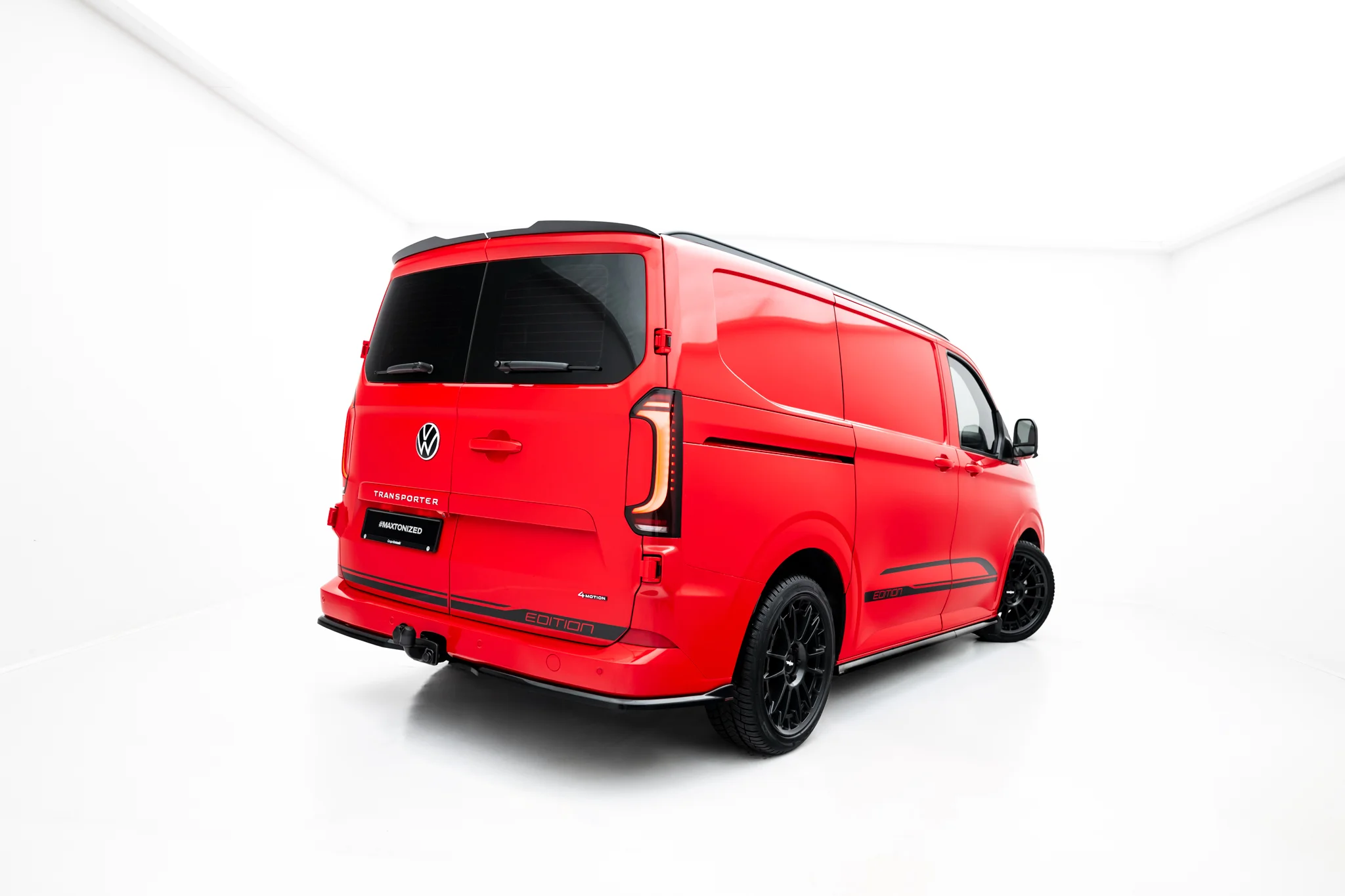 pol_po_Rear-Side-Splitters-Volkswagen-Transporter-T7-23936_6webp - OPSHOLDERS Red VW Transporter van photographed in a white studio, viewed from the rear-right side