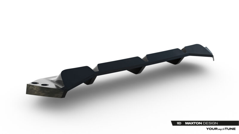 Dark, elongated automotive aero part with wing-like sections lying on a white surface; watermark reads Maxton Design.