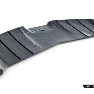 Glossy dark gray, segmented automotive aero part (diffuser/splitter) laid on a white background with a curved profile.