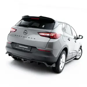 Rear three-quarter view of a silver Opel Grandland SUV, showing taillights, badge, and rear hatch (car angled from left-back).