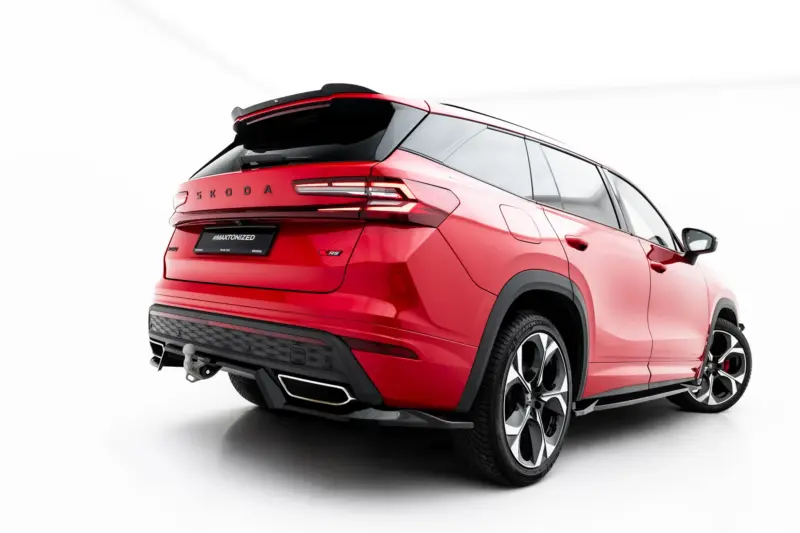 Red ŠKODA SUV shown from the rear-right angle, highlighting taillights, hatch, and alloy wheels