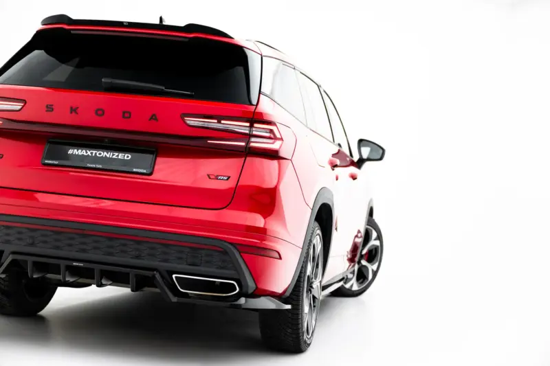 Red Skoda SUV shown from rear-right, highlighting the taillights and RS badge against a white background.