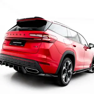 Red ŠKODA SUV viewed from the rear-right, showing distinctive taillights and rear bumper edge.